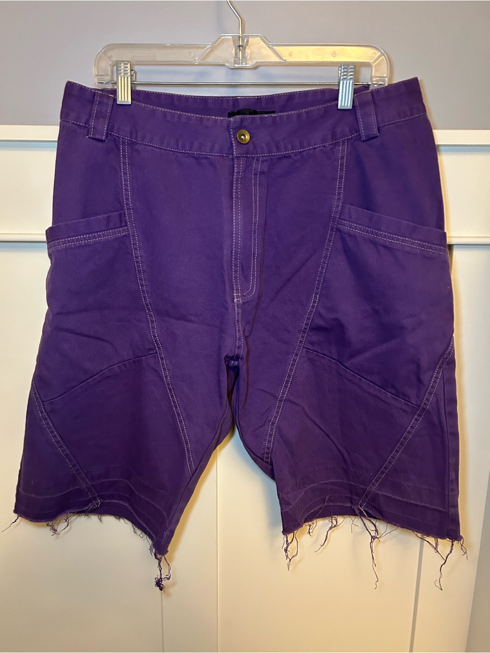 Vintage HTTP: distressed purple denim shorts